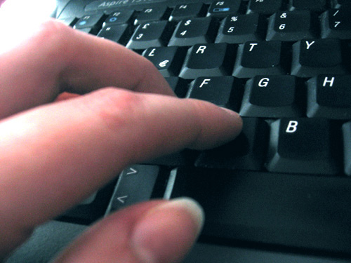 Writer typing on keyboard showing no Writer's Block